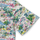 Serene coastal scene captured on a stylish short-sleeve shirt.