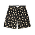 A pair of shorts featuring a design with delicate, light-colored flowers on a black background, creating a subtle yet striking contrast.