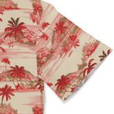 Sleeve of a Hawaiian shirt featuring a design with red palm trees and tropical scenery on a light-colored background