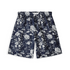 A pair of shorts featuring intricate white and light-colored flowers on a dark blue background, creating a sophisticated and timeless floral pattern.