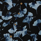 Modern ginkgo leaf patterned shirt in shades of blue.