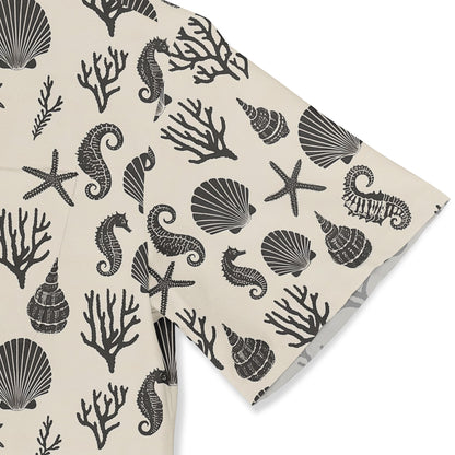 Close-up of a marine life print featuring seahorses and seashells on a neutral background.