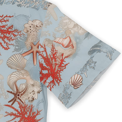 Vibrant coral reef patterns on a serene blue shirt.