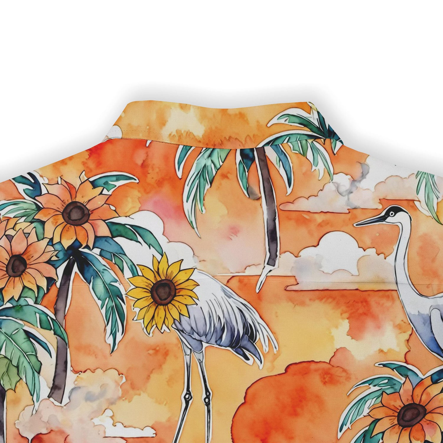 Graceful cranes and sunflowers against a tropical sunset on a stylish shirt.