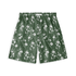 Green short with white floral pattern, showcasing delicate blossoms in a serene design.