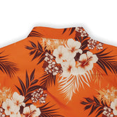 Tropical flower pattern on an orange short-sleeve shirt.