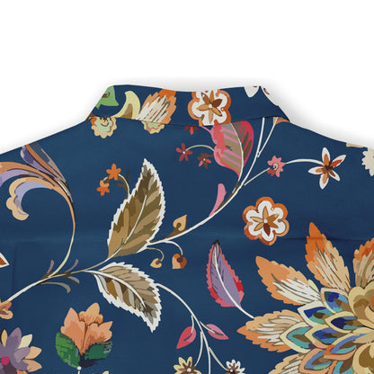 Back view of a shirt featuring a vibrant floral design with leaves and intricate patterns on a deep blue background.