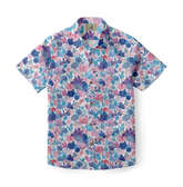 Colorful shirt featuring detailed coral reef and marine life designs in shades of blue, pink, and purple.