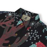 Close-up of a Hawaiian shirt collar featuring a dark underwater-themed design with corals, sea anemones, and abstract aquatic elements.