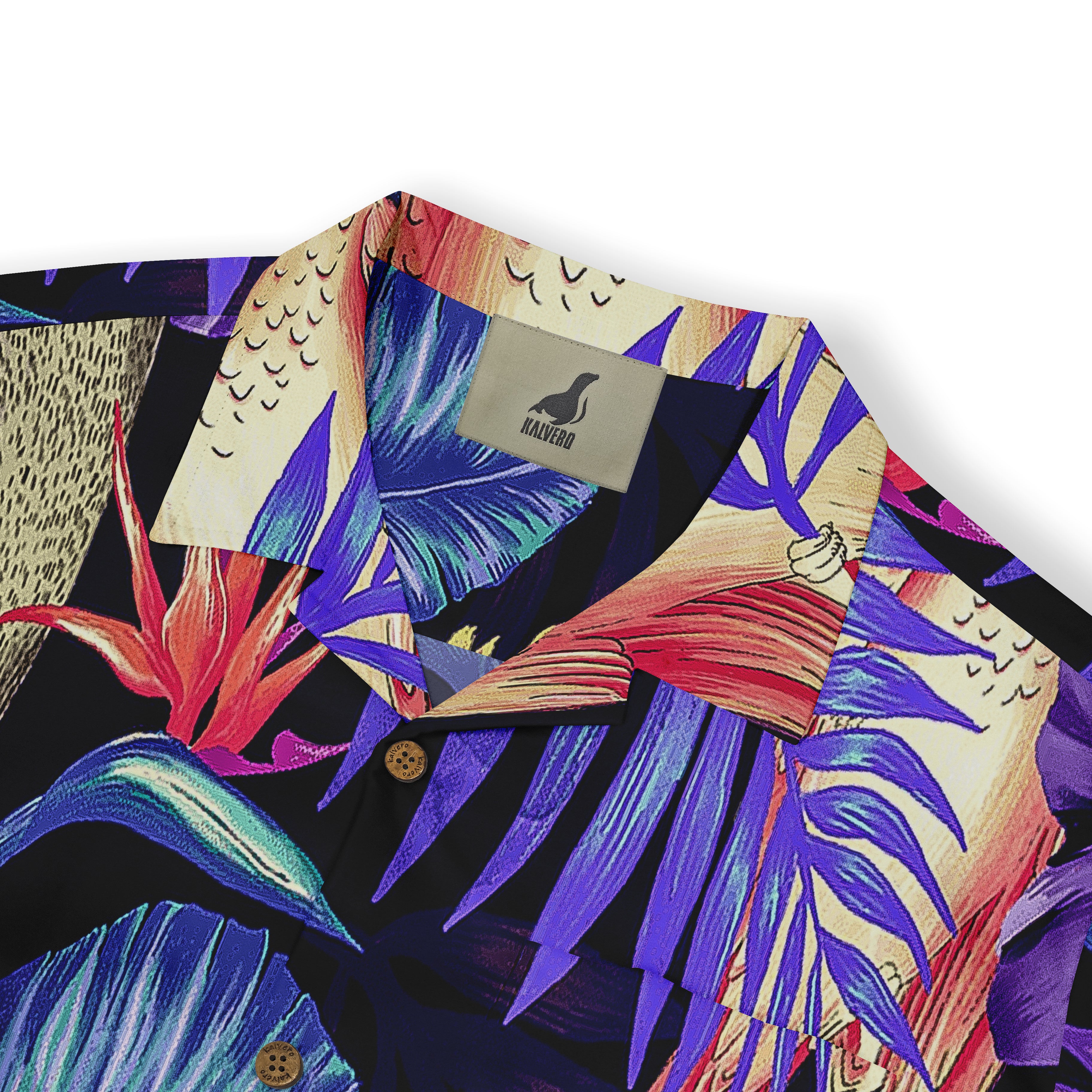 Close-up of a shirt collar featuring a vivid tropical print with purple leaves, a parrot, and vibrant floral elements on a dark background.