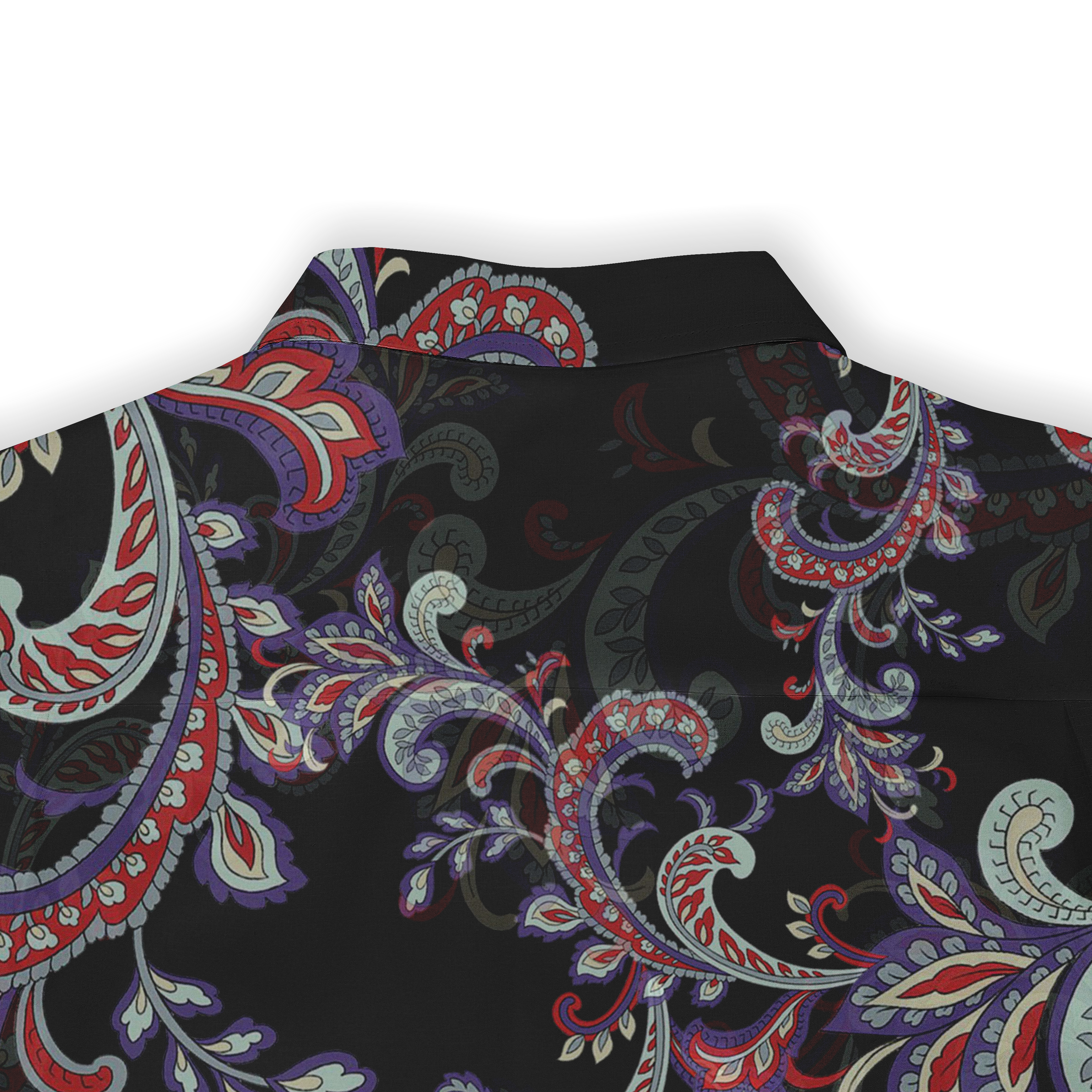 A close-up of the back collar of a shirt featuring a paisley design with intricate red, purple, and green swirls on a black background.