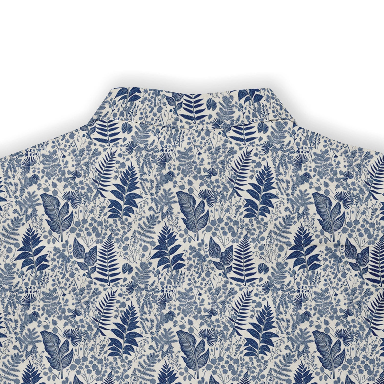 Pale blue shirt with green ferns and wildflowers, reminiscent of a forest floor back view