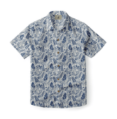 Pale blue shirt with green ferns and wildflowers, reminiscent of a forest floor.