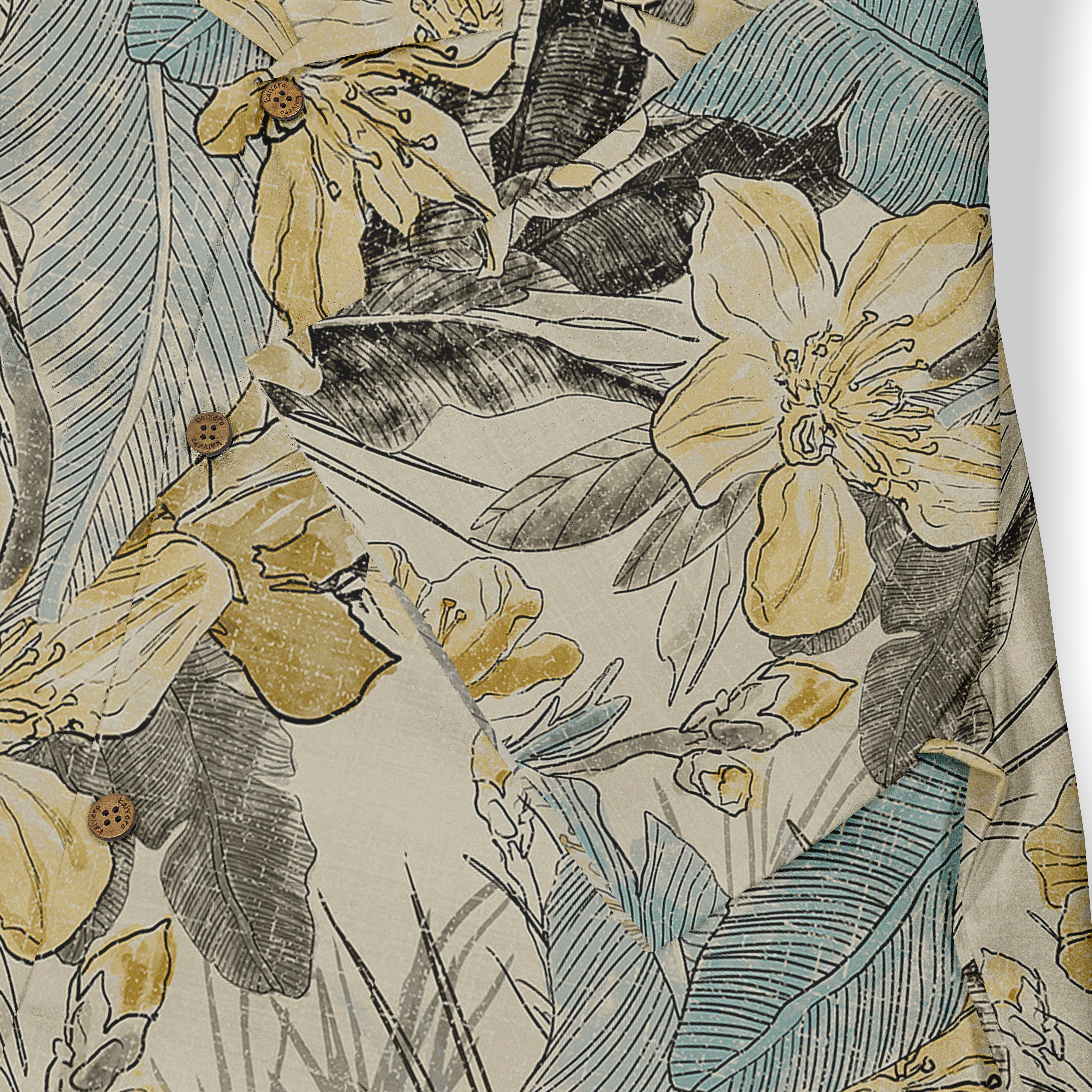 Close-up of a Hawaiian shirt showcasing a detailed floral pattern with yellow flowers, blue leaves, and black accents on a beige background, highlighting the intricate design and button details.