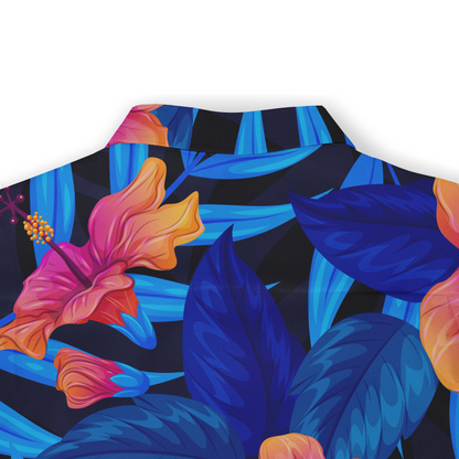 This image features the back of a Hawaiian shirt showcasing a bold, colorful design with large blue leaves and vibrant pink-orange flowers against a dark background. The pattern is eye-catching and detailed, emphasizing the tropical theme of the garment.