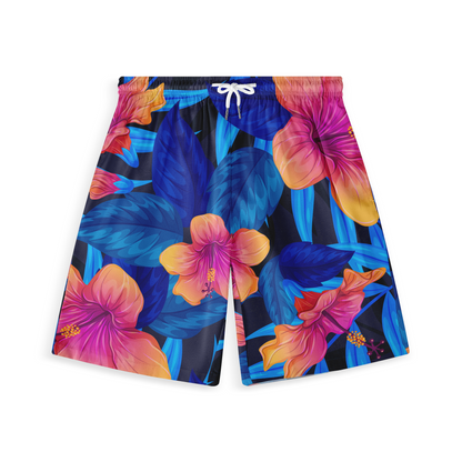 This image displays a pair of vibrant shorts with a tropical design featuring large blue leaves and bold, colorful flowers in shades of pink, orange, and purple against a dark background. The pattern is lively and eye-catching, ideal for a tropical or beach-themed look.