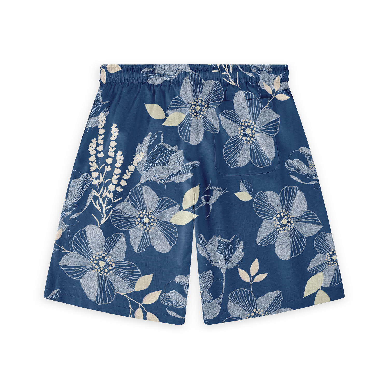 These shorts showcase a charming floral design in soft white on a deep blue background, combining style and comfort effortlessly. Ideal for a relaxed yet polished look, they&