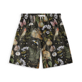 Dark-themed shorts featuring an enchanting woodland print with rabbits, birds, bees, pears, and delicate florals, creating a whimsical and nature-inspired design.