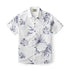 A shirt with a serene botanical pattern featuring various tropical leaves in soft blue tones on a white background.