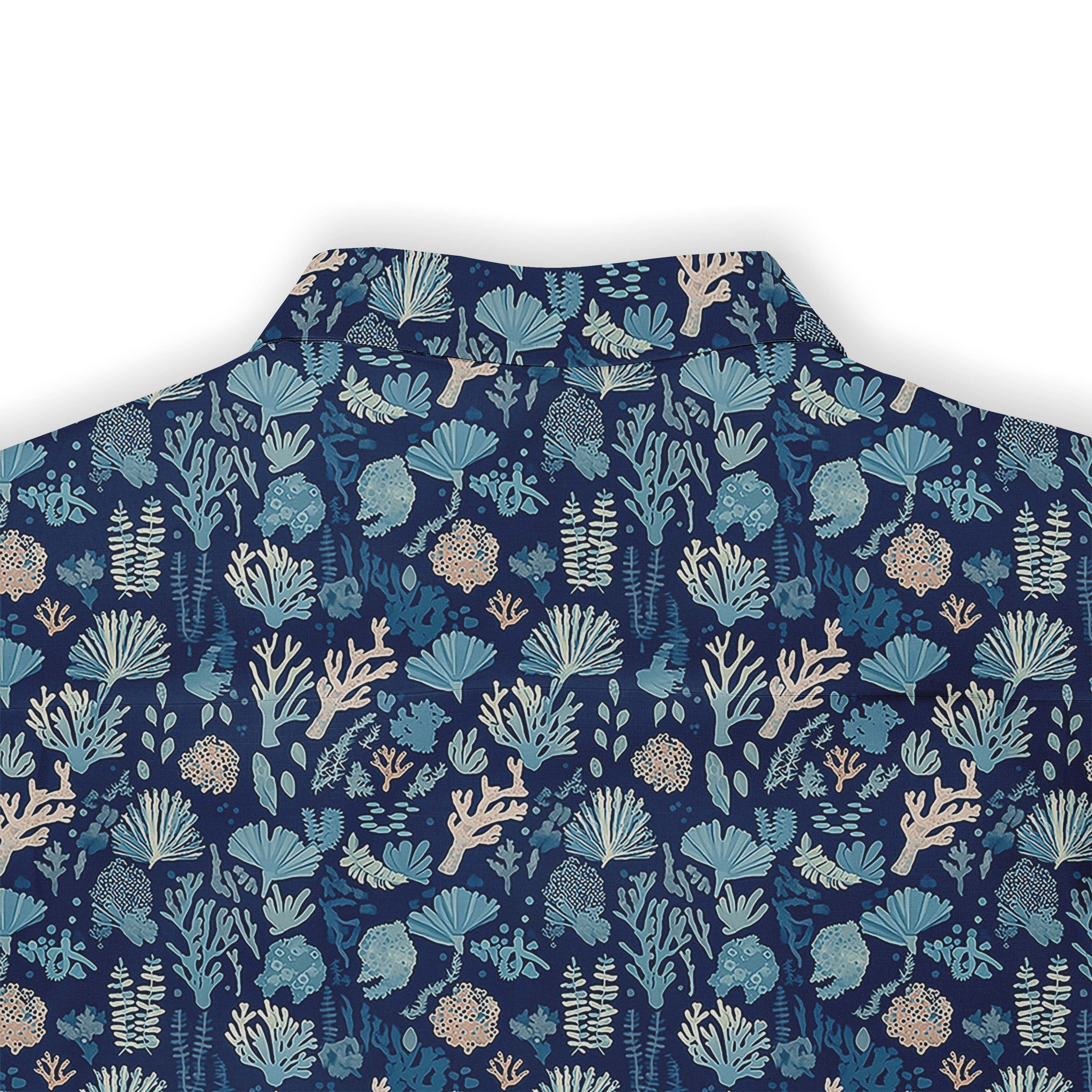 Deep blue shirt with delicate coral and seaweed illustrations depicting a nighttime ocean scene back view