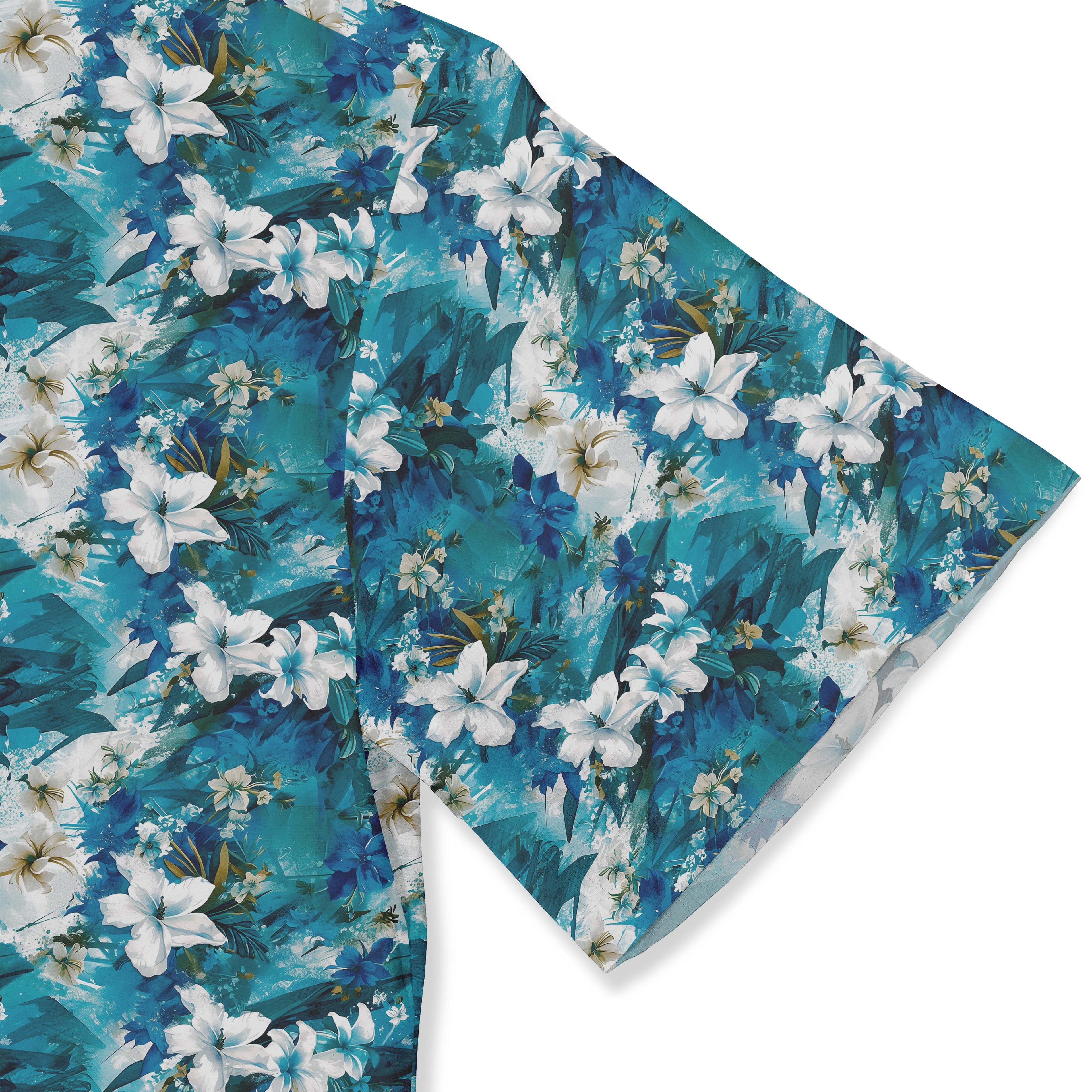 Blue shirt with white flowers and green leaves, evoking an oceanic landscape close-up