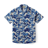 Shirt with a design featuring dynamic ocean waves and leaping dolphins in deep blue and white hues inspired by traditional Japanese wave art.