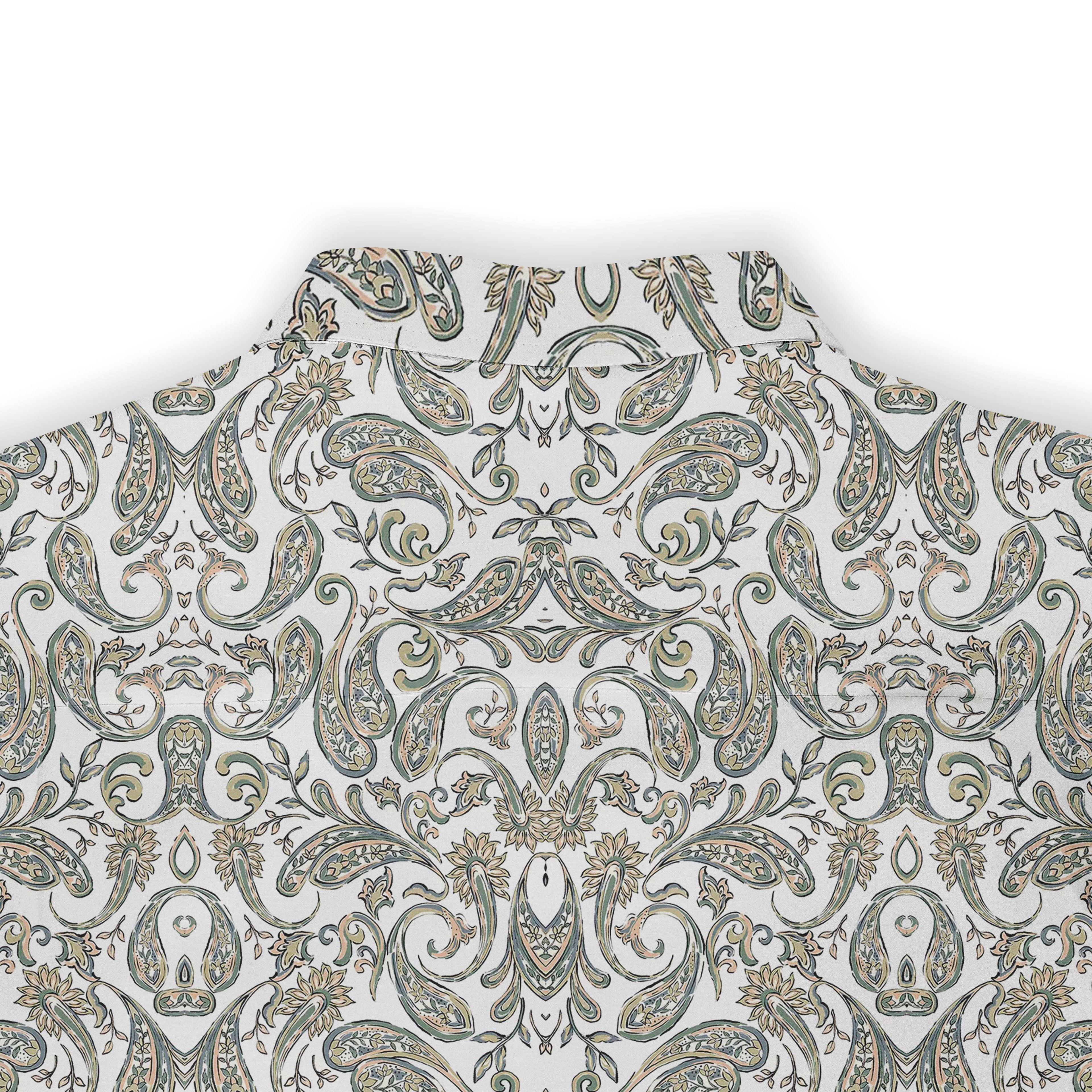 A short-sleeved shirt with a &quot;Serenity Scrolls&quot; pattern, featuring blue and white paisley motifs and floral vines framed by geometric borders back view