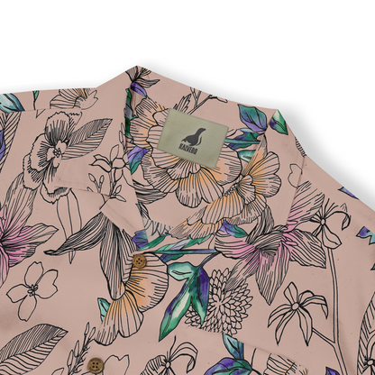 This is a Hawaiian shirt featuring an intricate floral pattern with shades of purple, green, and orange on a soft beige background, complete with brown buttons and a brand label.