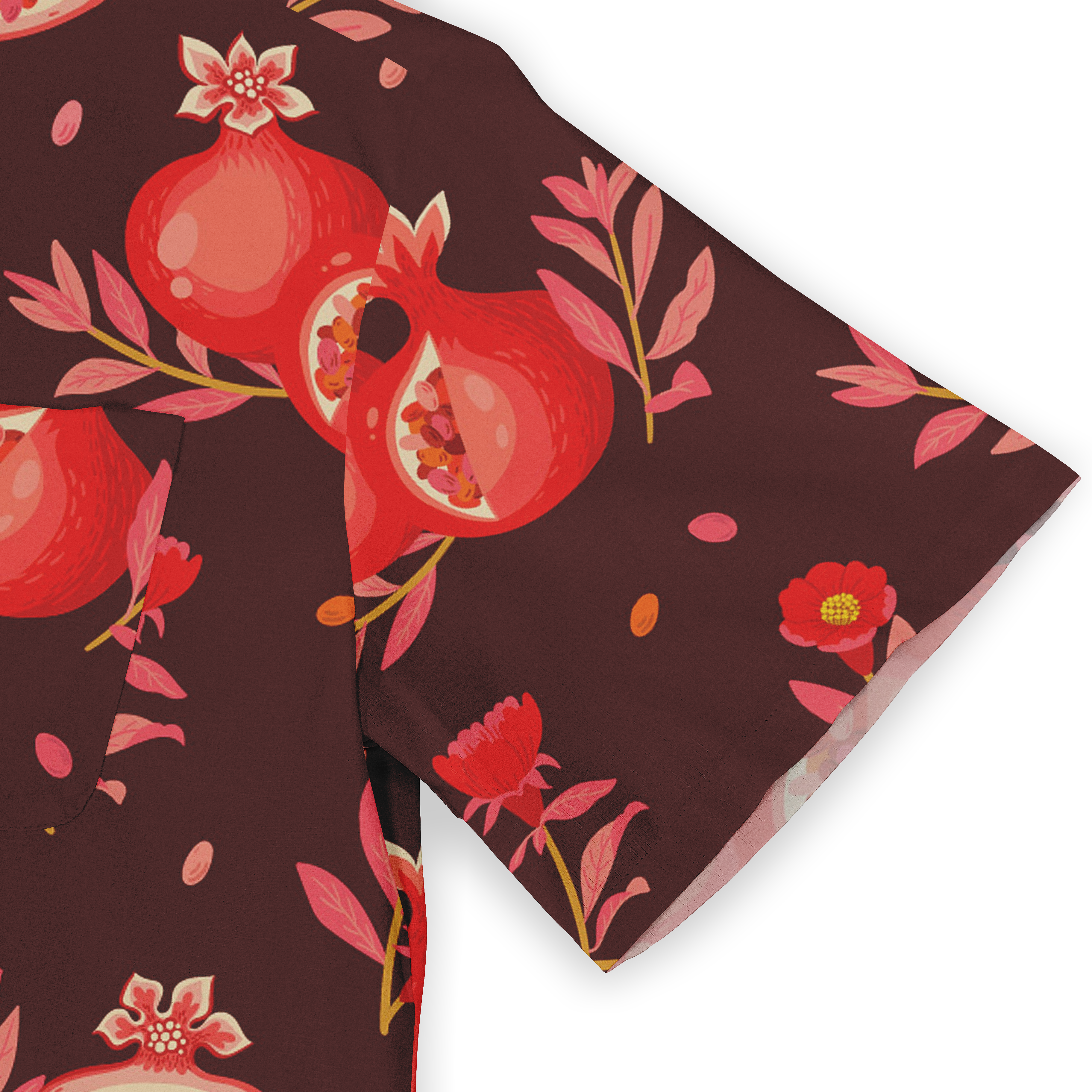 Close-up of a Hawaiian shirt sleeve with a pomegranate and floral pattern in red and pink tones on a deep burgundy background.