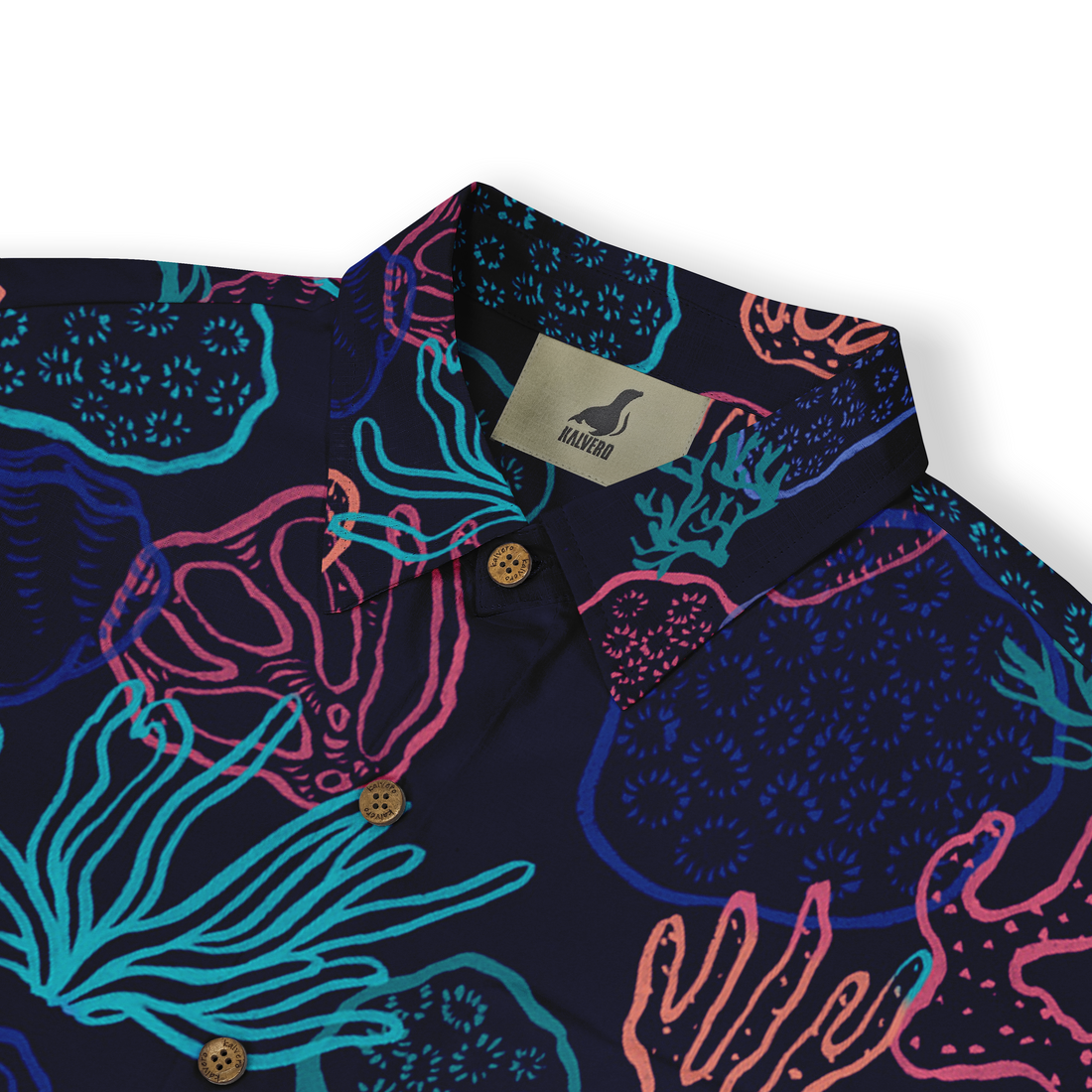 Close-up of a Hawaiian shirt collar with a vibrant coral reef pattern in neon colors on a dark background, featuring brown buttons.