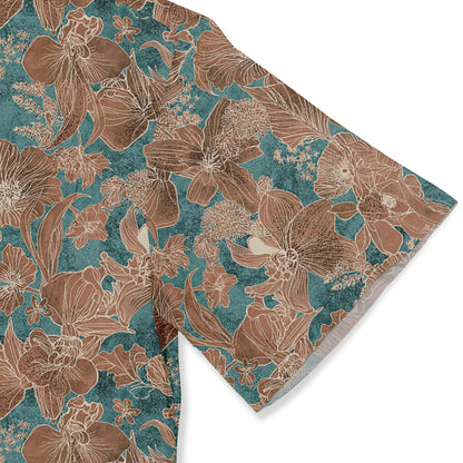 Close-up of a Hawaiian shirt sleeve with a floral pattern in brown and teal tones.