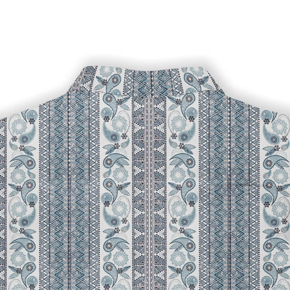 A short-sleeved shirt with a &quot;Serenity Scrolls&quot; pattern, featuring blue and white paisley motifs and floral vines framed by geometric borders back view