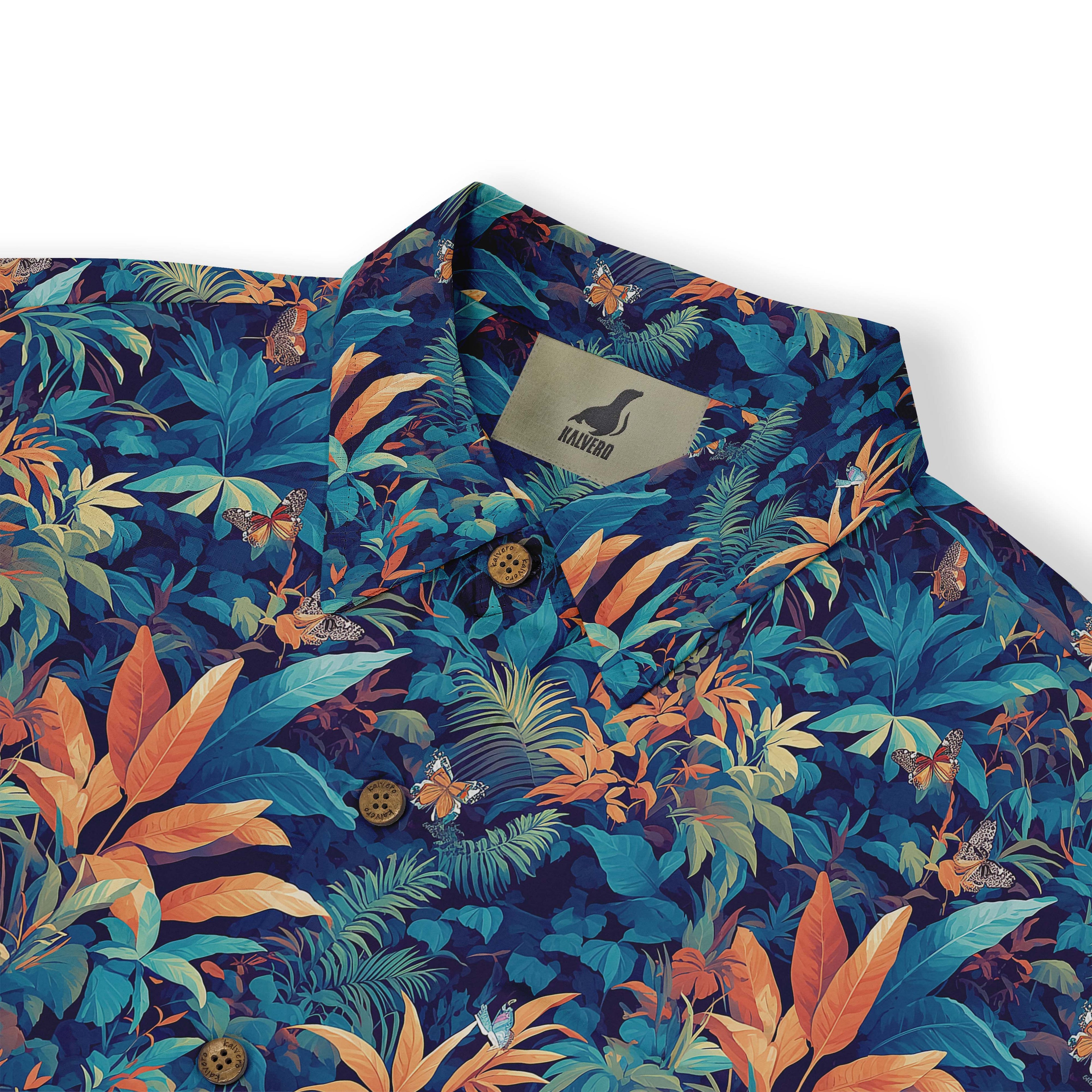 Dark teal shirt with vibrant tropical flowers and foliage, evoking a tropical paradise front view