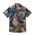 Shirt featuring a colorful parrot surrounded by vibrant tropical flowers and foliage on a rich blue background.