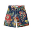 Bright and colorful shorts featuring a detailed design of a vibrant parrot among large tropical flowers and leaves on a deep blue background.