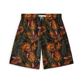 Dark shorts with a vibrant design featuring orange tropical leaves and colorful parrots, creating a bold and lively pattern.