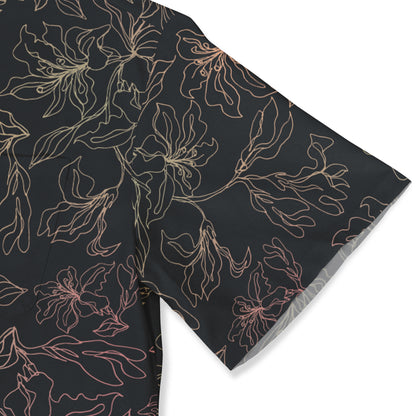 This image highlights the sleeve of a shirt featuring a subtle floral pattern against a dark background. The delicate lines of the flowers create a sophisticated, understated design that adds elegance to the overall look.