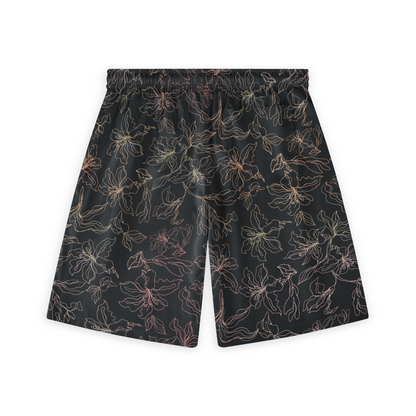 These shorts showcase a delicate floral pattern in soft tones on a dark background, creating a subtle and elegant look.