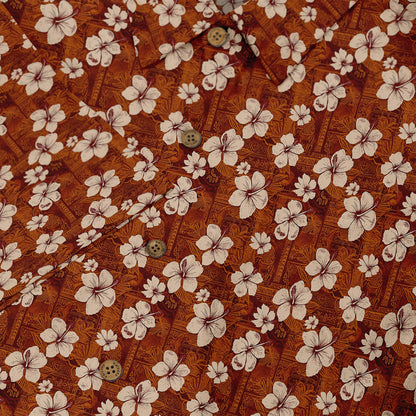 Copper shirt with white hibiscus flowers, exuding vintage elegance close-up