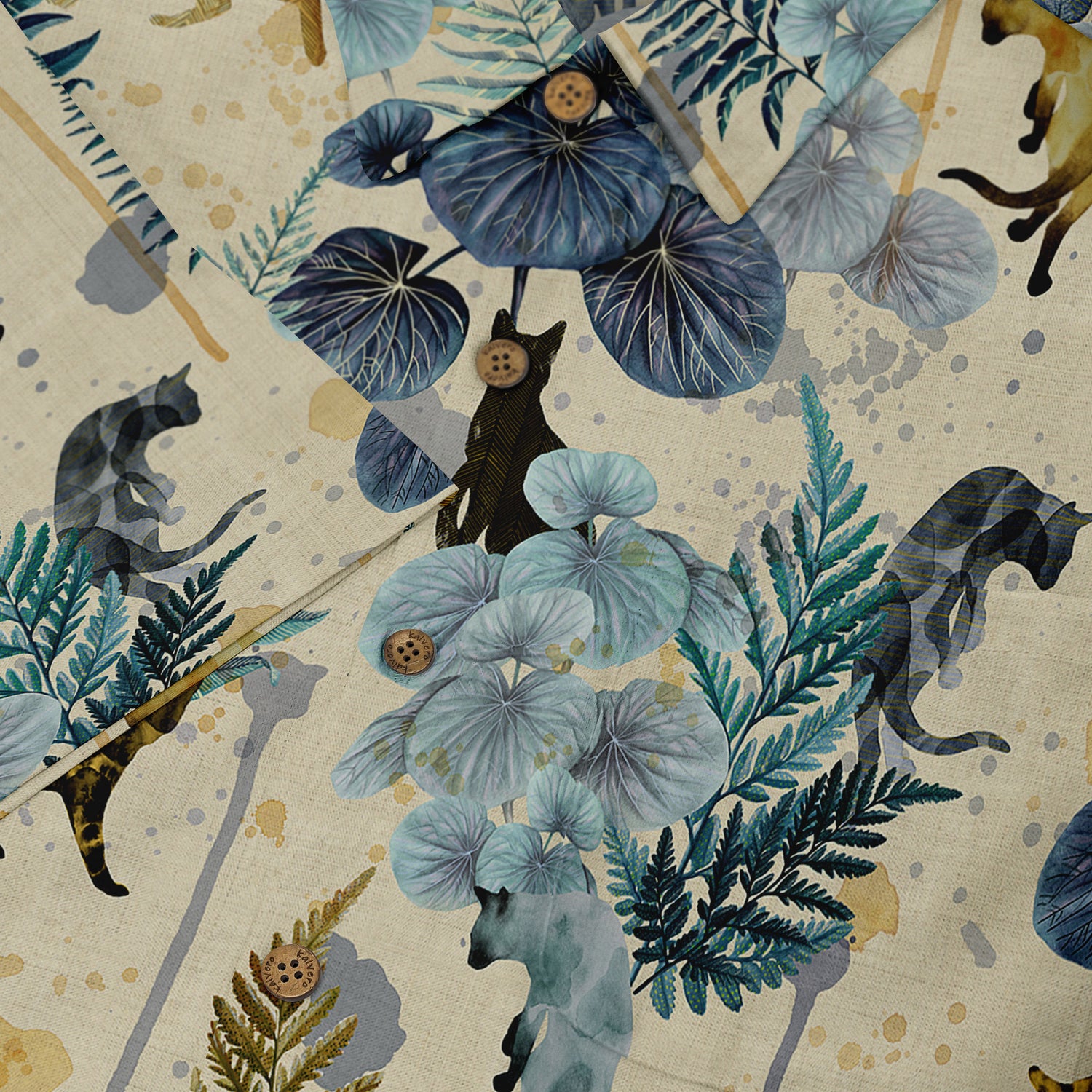 This is a close-up of a fabric pattern featuring botanical elements and leopard motifs in shades of blue, green, and beige, set against a textured, earthy background. The detailed design includes leaves, leopard silhouettes, and textured buttons, enhancing the natural and wild theme.